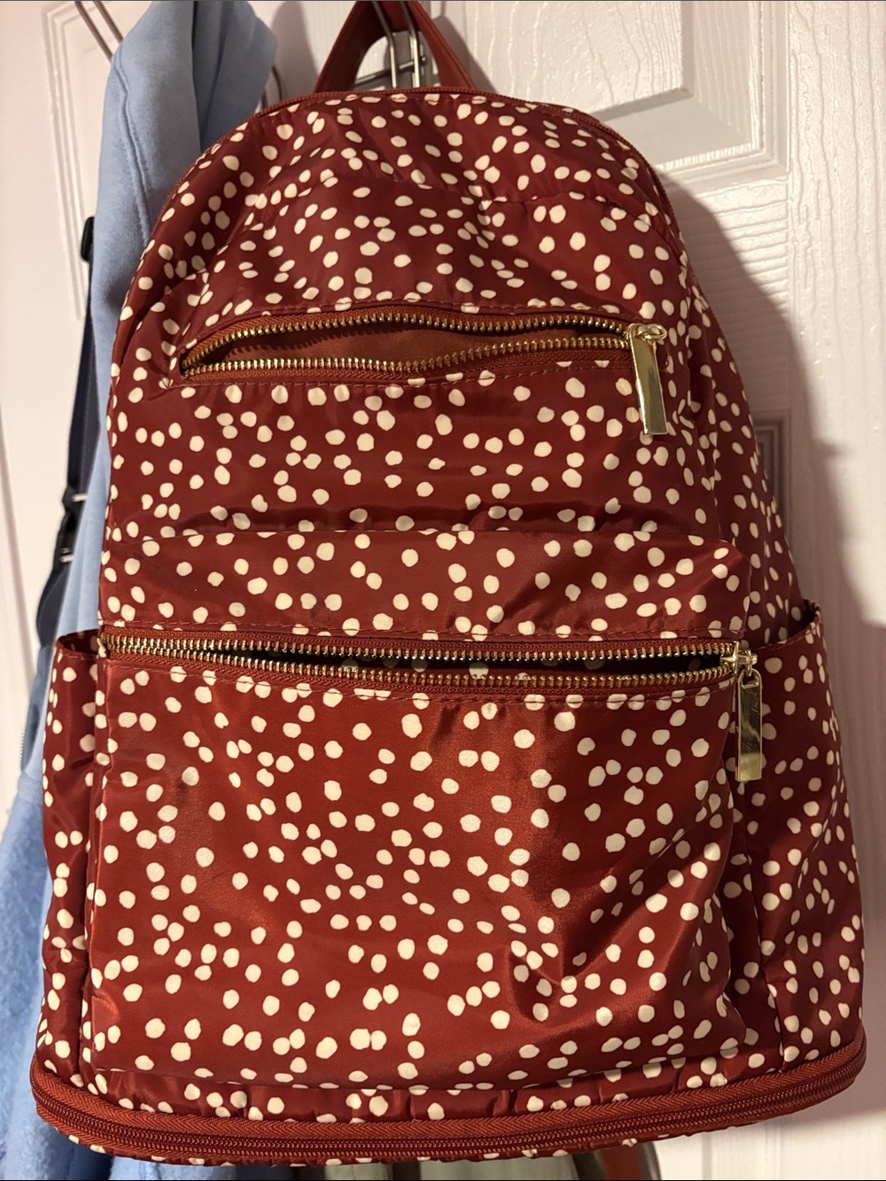 More of a rust /White Polka Dot Nylon Backpack